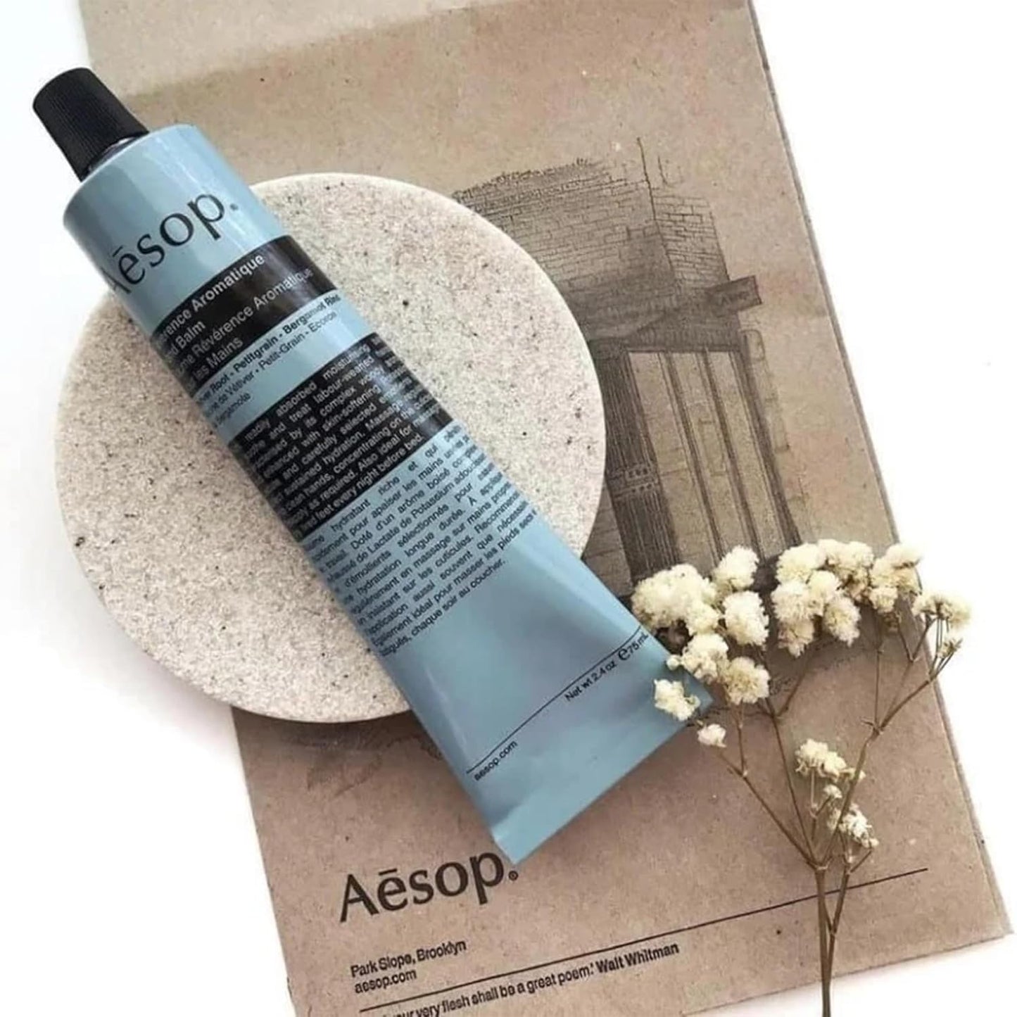 Aesop Reverence Aromatique Travel Size Hand Balm | Lotion that Gently Exfoliates Dry Hands + Nourishes with Macadamia Seed Oil and Shea Butter | 2.4 oz / 75 mL